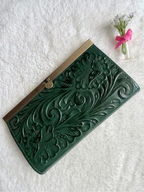Elegant Cauchy Wallet from Patricia Nash green tooled floral-embossed leather.